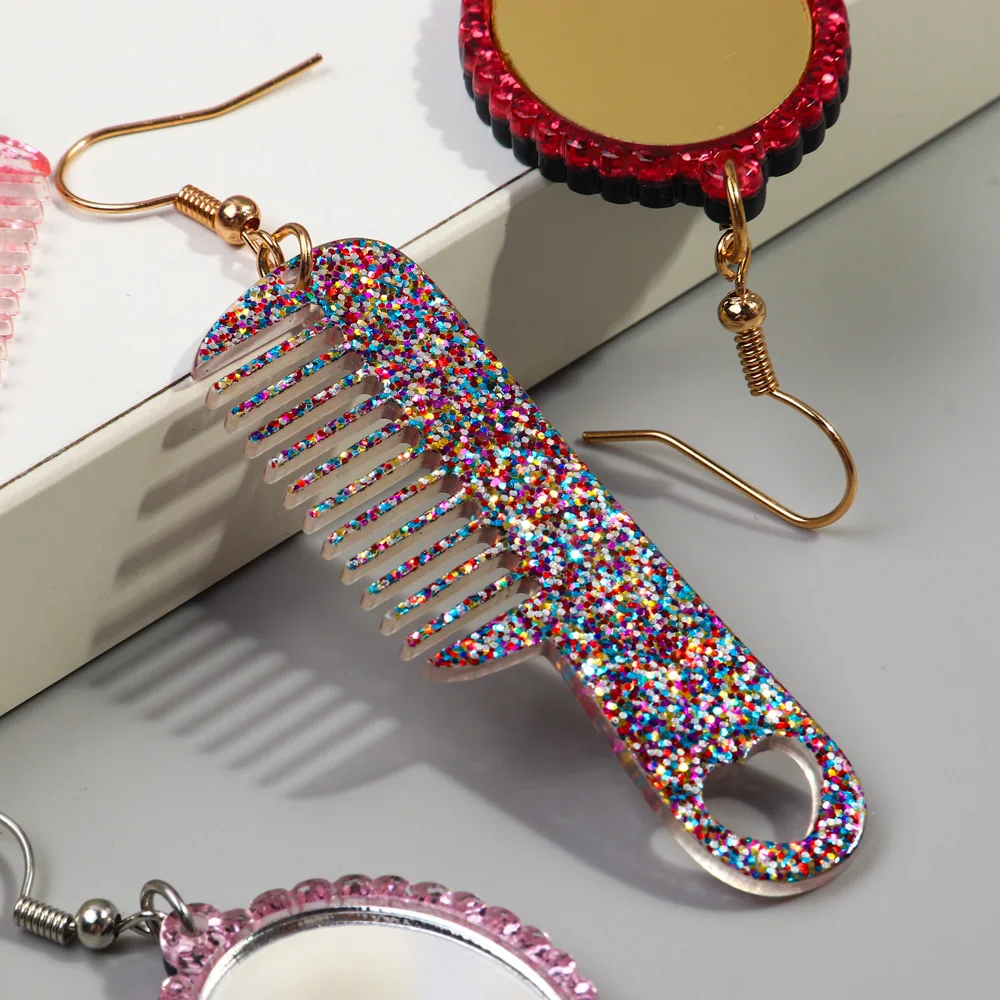 עגילי מברשת ומראה