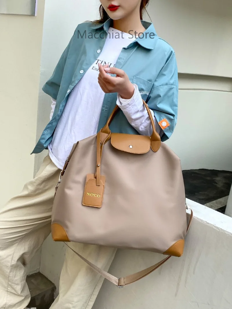 Viaggi corti da donna leggera grande capacità al di fuori del lavoro pendolarismo Tote monospalla elegante stile semplice