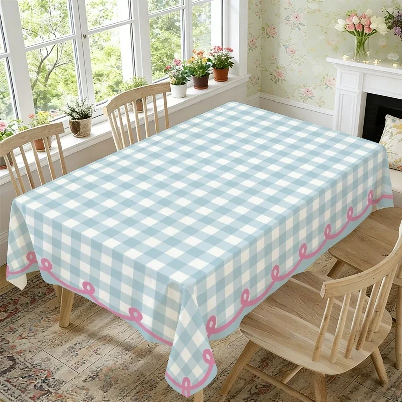 One light blue and white checked tablecloth with pink trim, suitable for spring and summer decor.