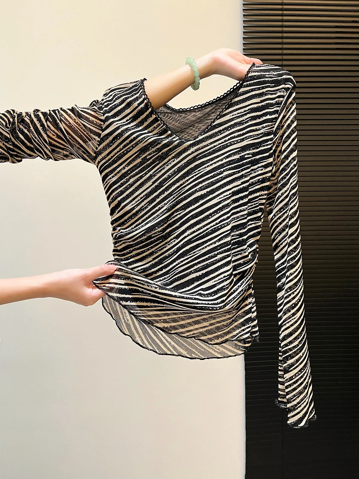 

Women's Black & White Diagonal Stripe Long Sleeve Top with Sheer Mesh, V-Neck Lace Accent and Ruffle Hem