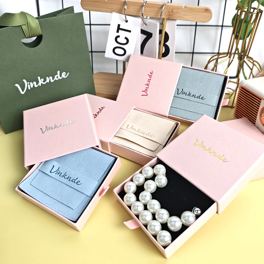 

Custom Logo 50pcs Jewellery Packaging Pouch Cardboard Drawer Box Fashion Earrings Rings Packaging Boxes With Suede Wedding Bag