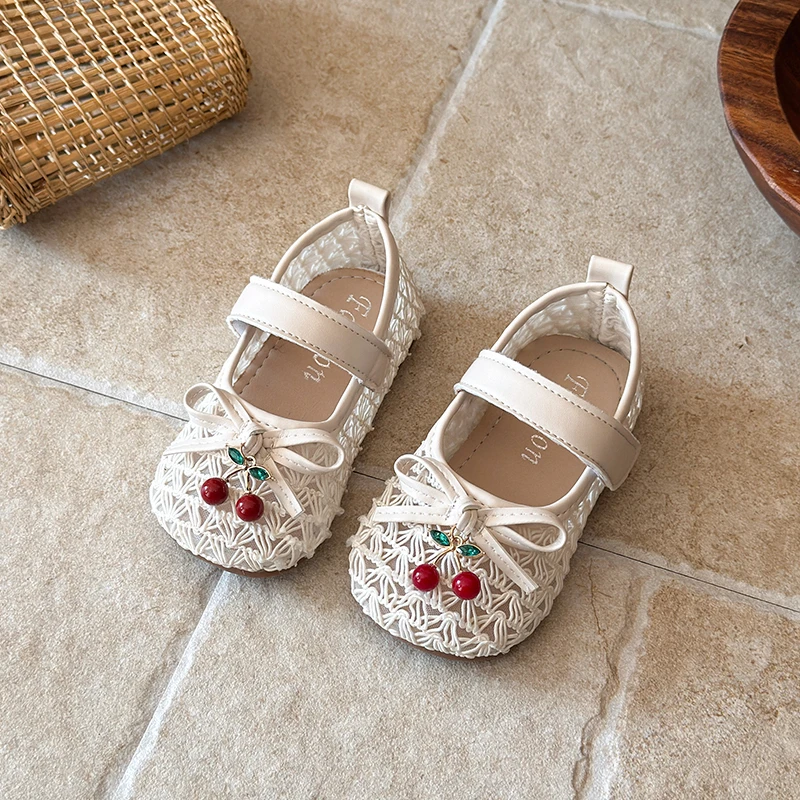 2026 Summer Girls Cute Bow Cherry Decorative Baotou Sandals Hollow Breathable Flat-bottomed Non-slip Children's Beach Sandals.