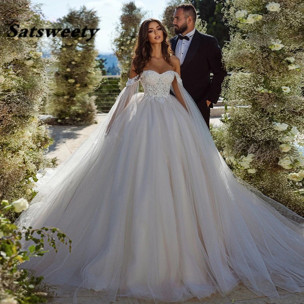 

Women's Ball Gown Boat Neck Shiny Tulle Wedding Dresses 2024 Off Shoulder Princess Bridal Gown with Chapel Train