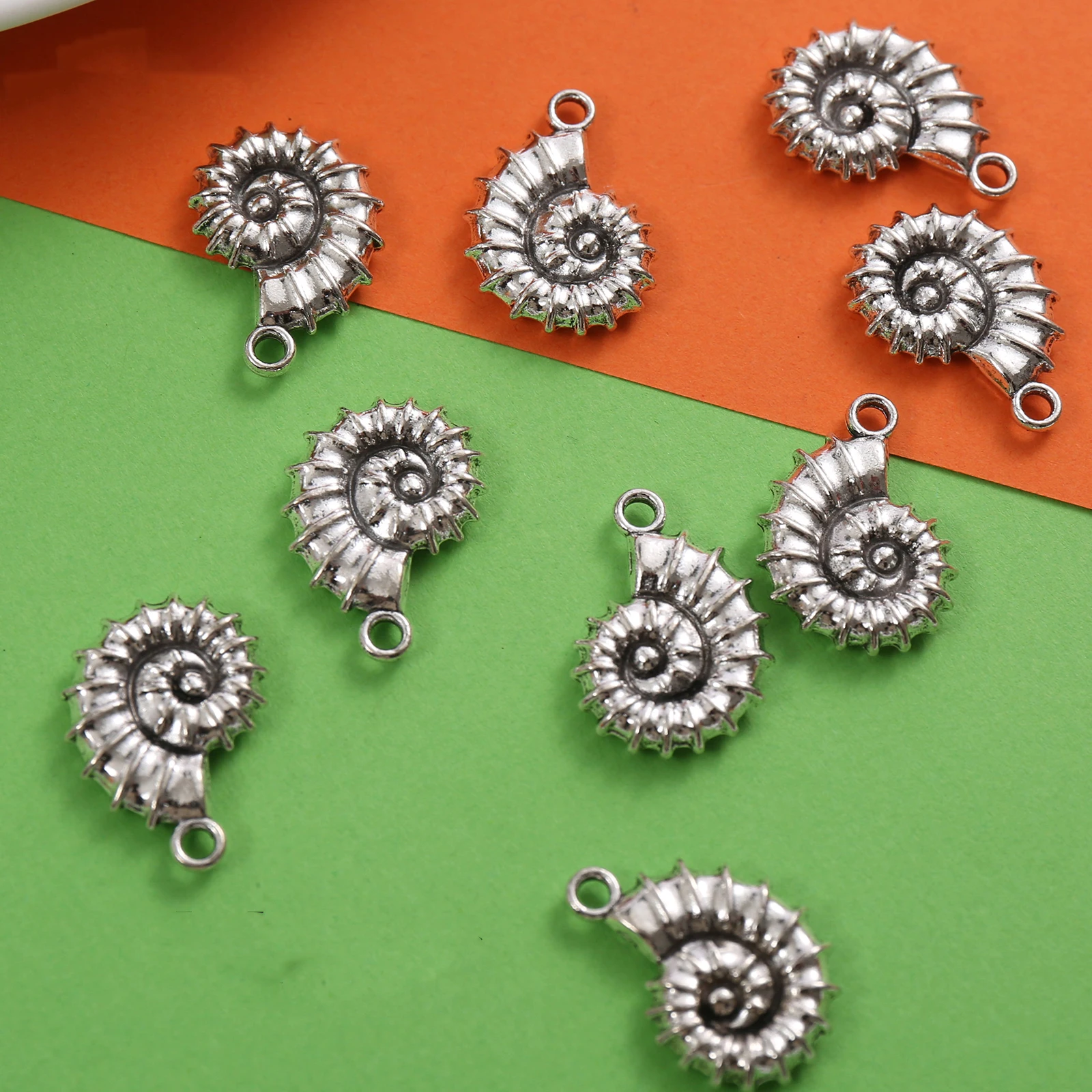 7 Pieces of Conch Spiral Charms, Metal Pendants with Spiky Texture and Ammonite Shell Patterns, Suitable for DIY Bracelets, Necklaces, and Earrings, Ocean-Themed Vintage Handmade Beaded Jewelry Accessories