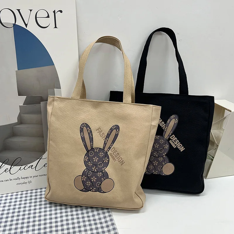 2023 primavera e autunno nuova borsa di tela portatile stampata Shopping da donna borsa a tracolla Casual borsa a tracolla carina semplice