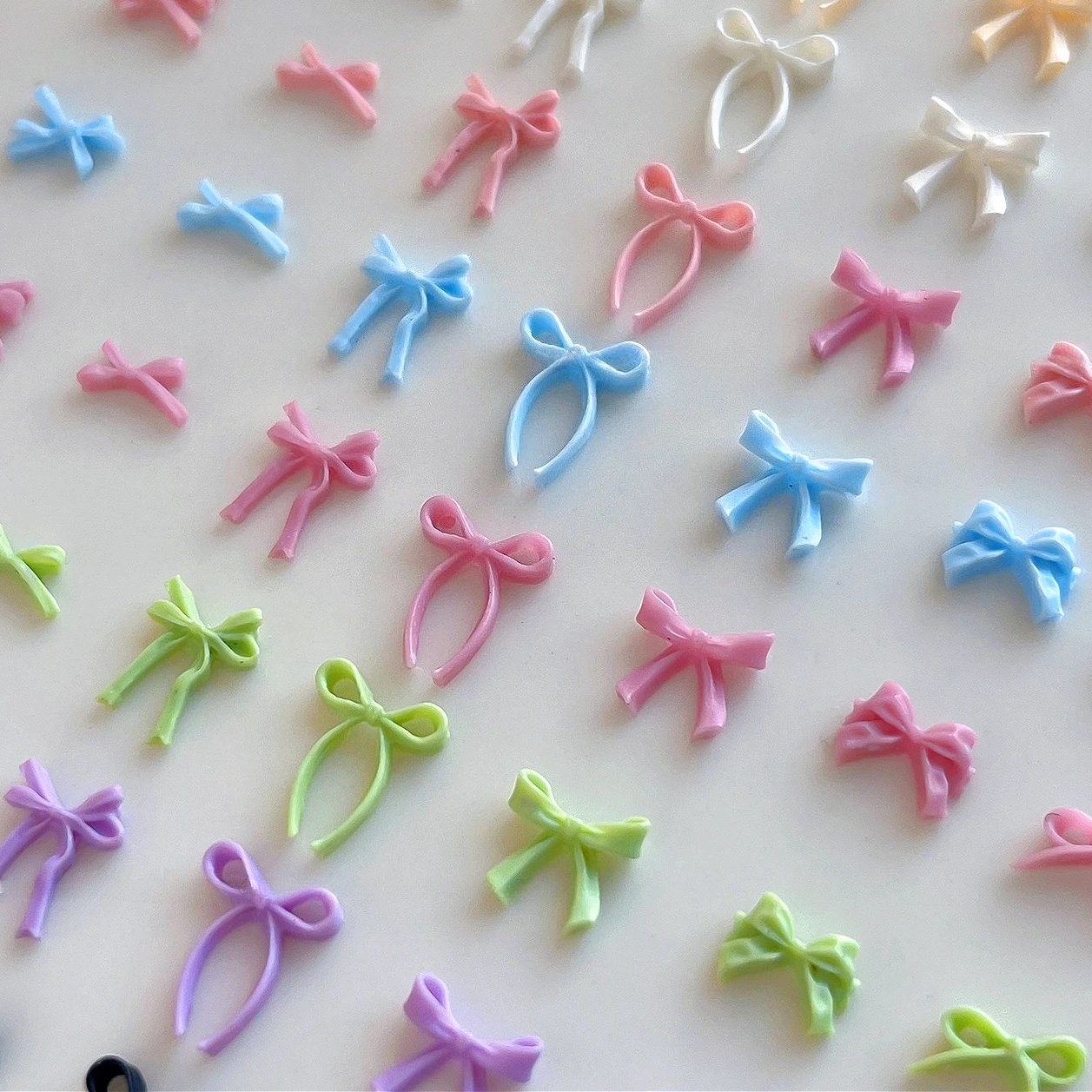 

Simple Resin Bow Tie Small Bowknot Cute Ribbon Colored Sweet Delicate Nail Art Accessories Charms Decorations Manicure Wholesale