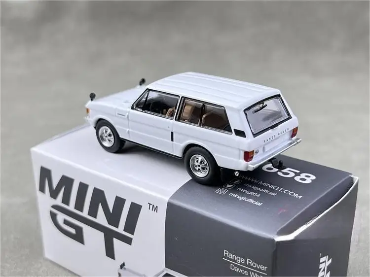 ของขวัญชุดจัดแสดงโมเดลรถยนต์คอลเลกชัน TSM MINI GT 1/64 minigt 658 Range Rover Davos โลหะผสมหล่อขึ้นรูปแบบขาว