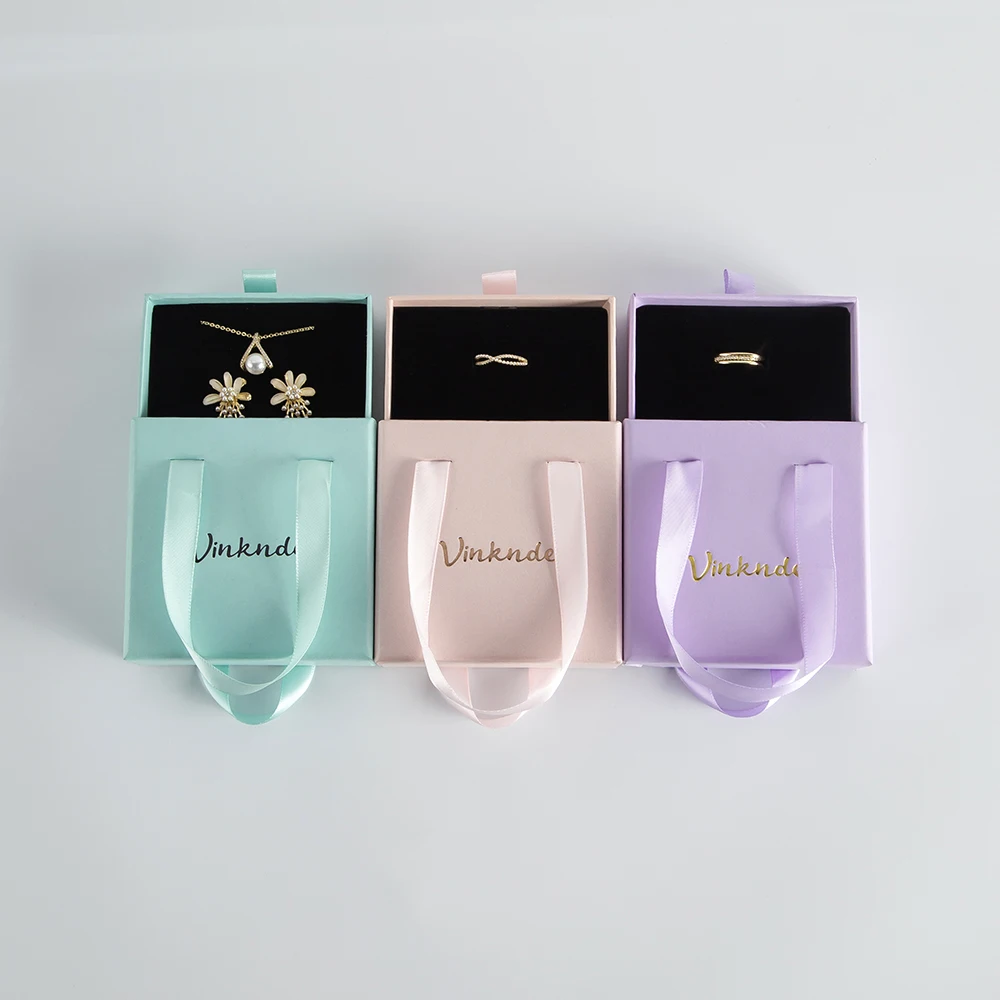 Cajón deslizante pequeño de lujo con logotipo personalizado, bolsa de compras de papel de Perfume para joyería, caja de pulsera con asa de cinta de