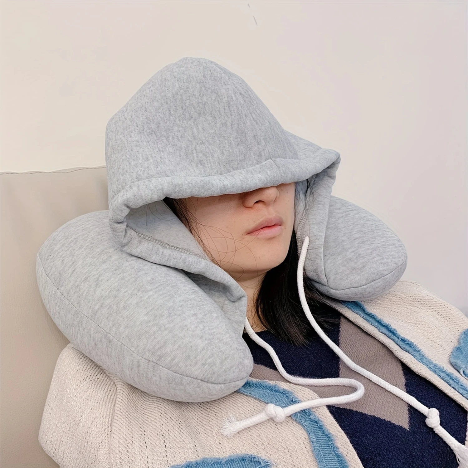 

Travel in comfort with our Portable U-Shaped Neck Pillow with Hood - Machine Washable, Woven Cover, 100% Polyester Fiber Filling