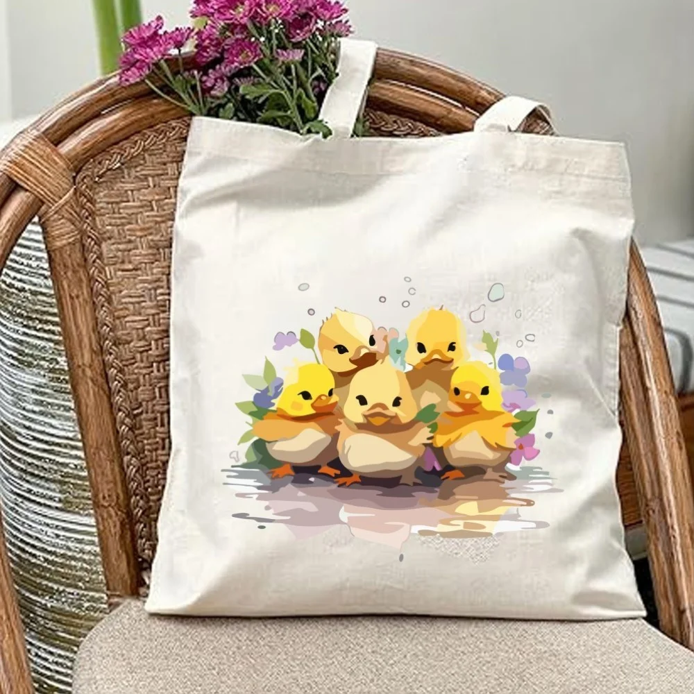 1 unidad: bolso de lona con estampado de flores y patos, de diseño estético y con motivos primaverales, de gran capacidad y resistente, ideal para actividades al aire libre, picnics, fiestas y viajes.