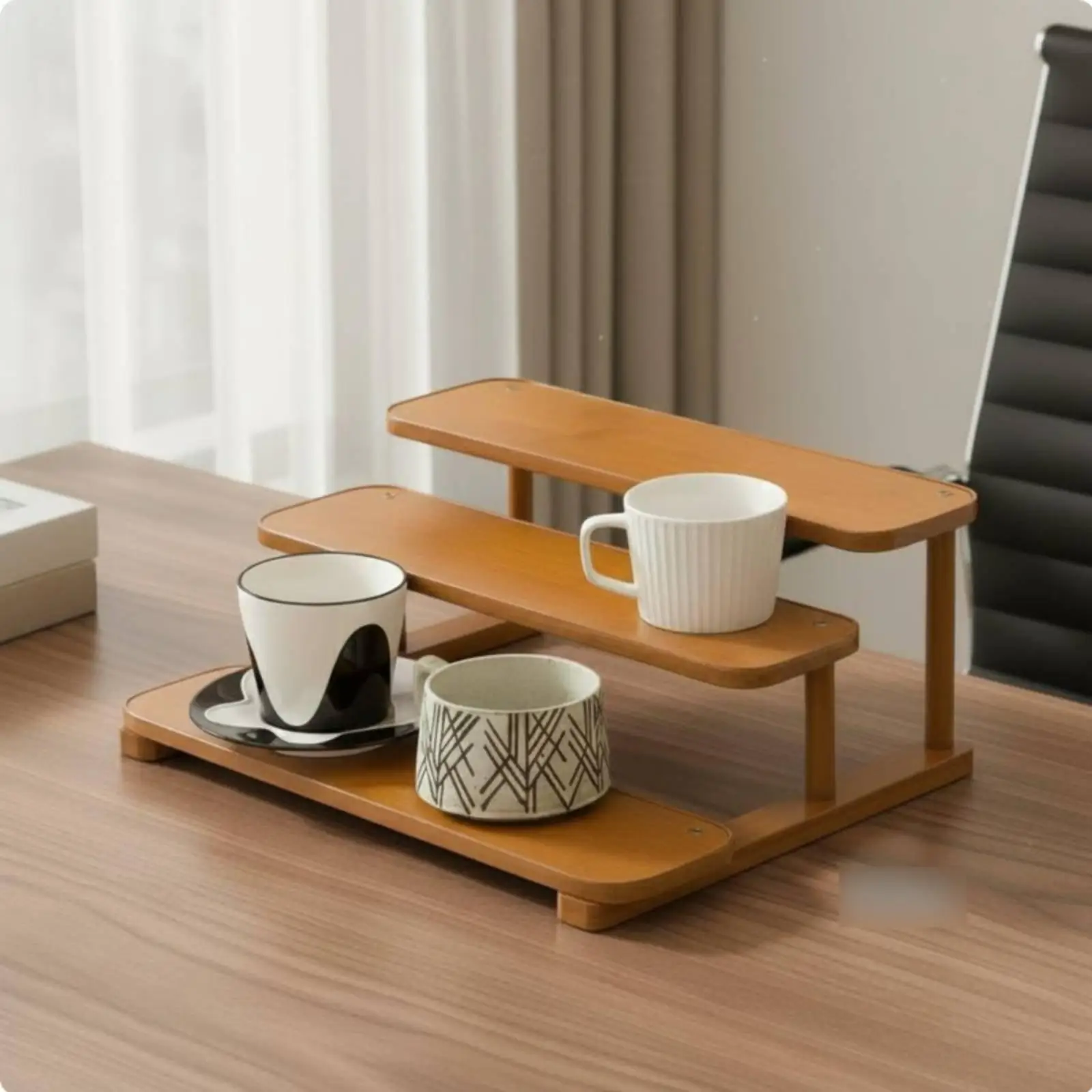 Space-saving tea service stand with multiple levels and a large cup tray.