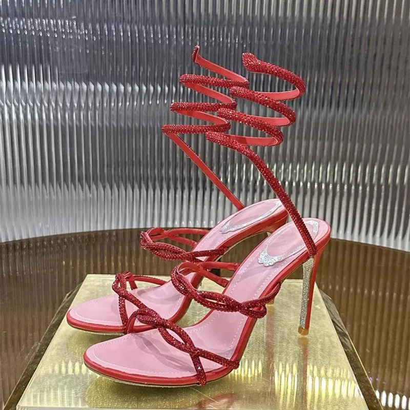 

Женские босоножки на шпильке с ремешком на щиколотке и стразами в виде змеи, модель 2026 года, роскошные туфли с ремешком сзади для вечеринок, банкетов и выпускных вечеров