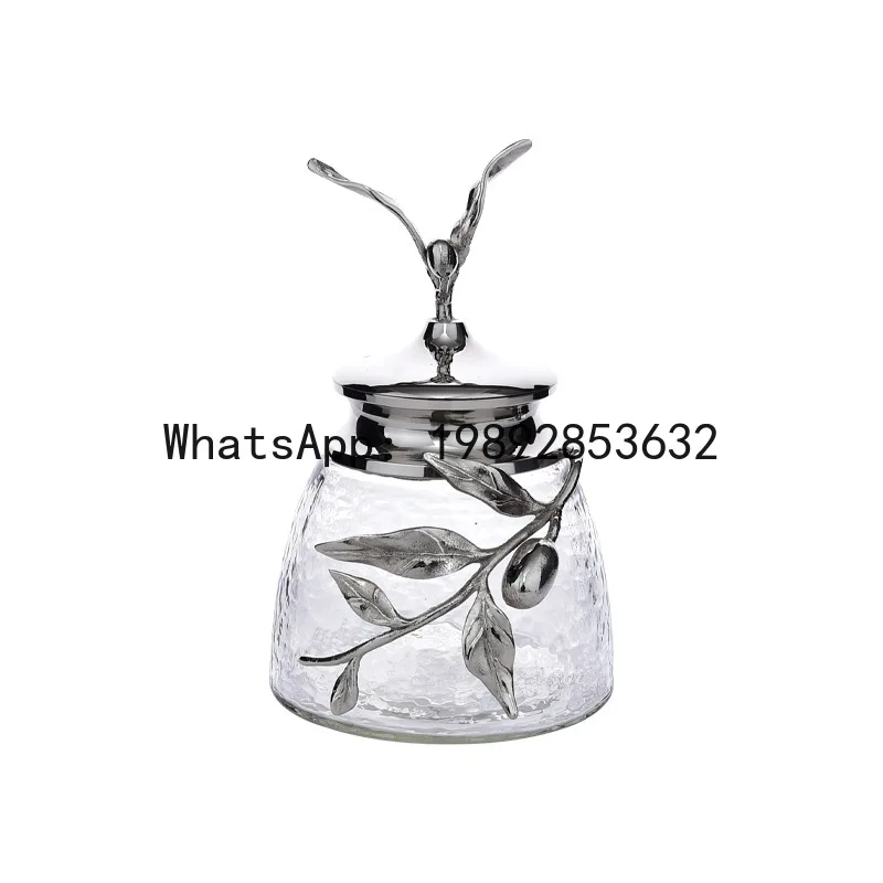 

X-23 brass modern style glass jar with metal lid and branch & leaf accents