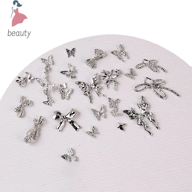 Dijes de aleación de plata para uñas, 10 piezas, joyería 3D, alas de mariposa, decoraciones, lazo de Metal de lujo, accesorios de manicura con diamantes