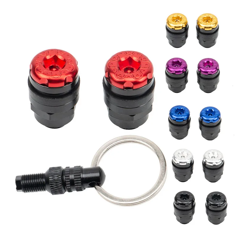 A pair of motorcycle tire valve cap lockers, aluminum, with operating tools for regular tire valve maintenance and D7YA