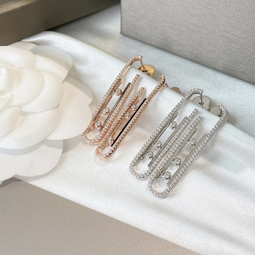 The new 925 sterling silver sliding zircon diamond earrings are high-end, fashionable, unique, and suitable for gift giving