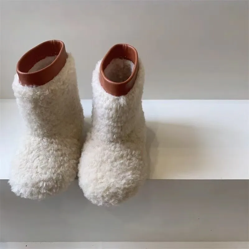 รองเท้าบูทขนสัตว์สำหรับเด็กผู้หญิงแฟชั่นใหม่ปี 2025 รองเท้าบูทกันหนาวบุขนสำหรับเด็ก รองเท้าบูทหิมะบุขนสำหรับเด็ก รองเท้าบูทผ้าฝ้ายสำหรับเด็ก รองเท้าบูทขนสัตว์แบบหุ้มข้อกลาง