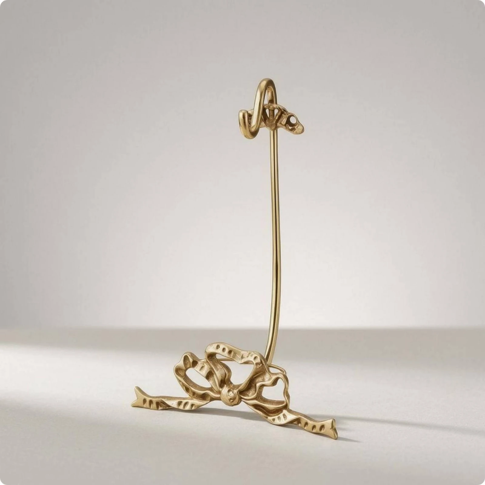 Bow-Shaped Display Stand Shiny Brass Display Stand Compact Ornamental