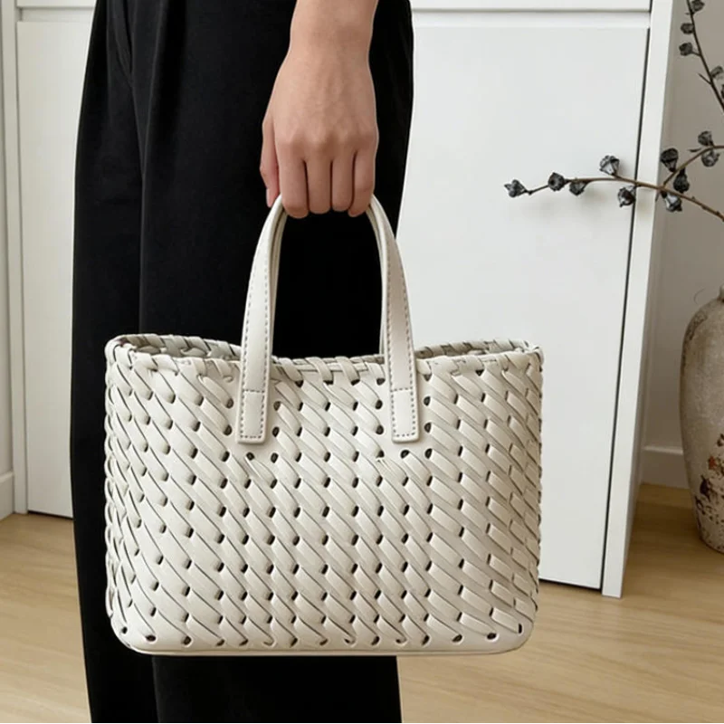 

Branded Hand-woven Tote Bag Soft Leather Perforated Breathable Tote Bag French Elegant Simple Large-capacity Crossbody Bag New
