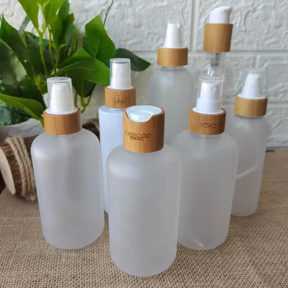 

Engraving logo Transparent white empty bamboo cosmetic packaging bamboo pump bottle frosted dropper Refillable Pipette BottleJar