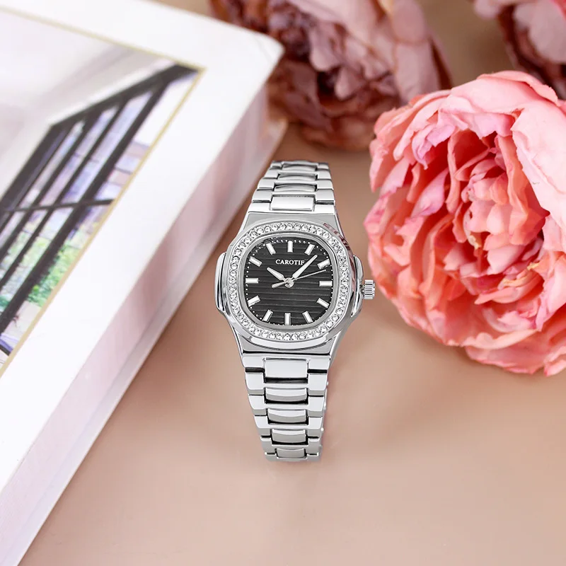 

A men's minimalist and stylish square automatic mechanical wristwatch with a silver stainless steel strap and baton hour markers