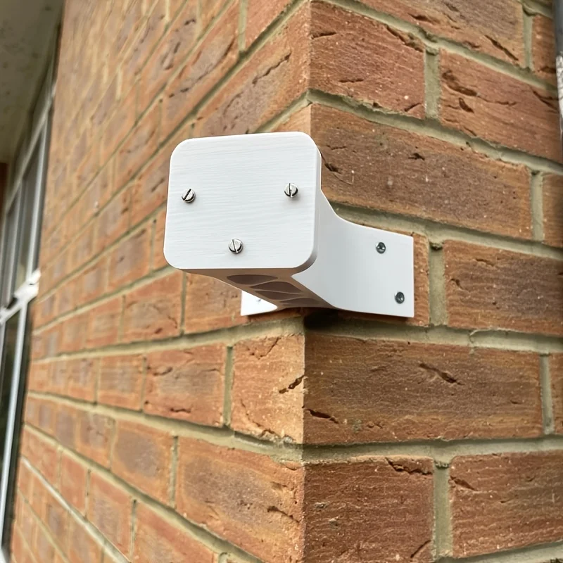 White Eufy S340 stand-alone camera, corner mounting bracket, long arm, external type