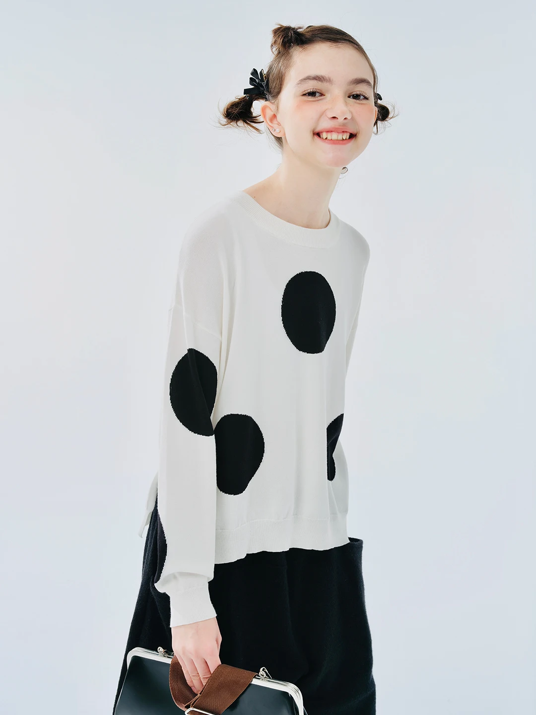 IMAKOKONI original design spring long-sleeved pullover black polka dot slit knitted top for women 244436