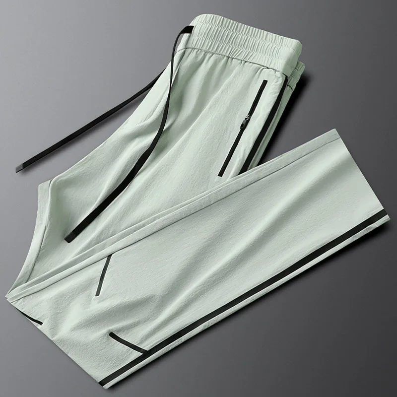 

Эластичные быстросохнущие повседневные спортивные брюки с карманом на молнии для мужчин, летние тонкие мужские спортивные штаны с завязками на небольшую ногу