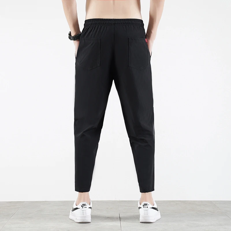 Męskie spodnie codzienne Business Stretch Slim Fit Elastic Waist Jogger Korean Classic Blue Black Grey Męskie spodnie markowe