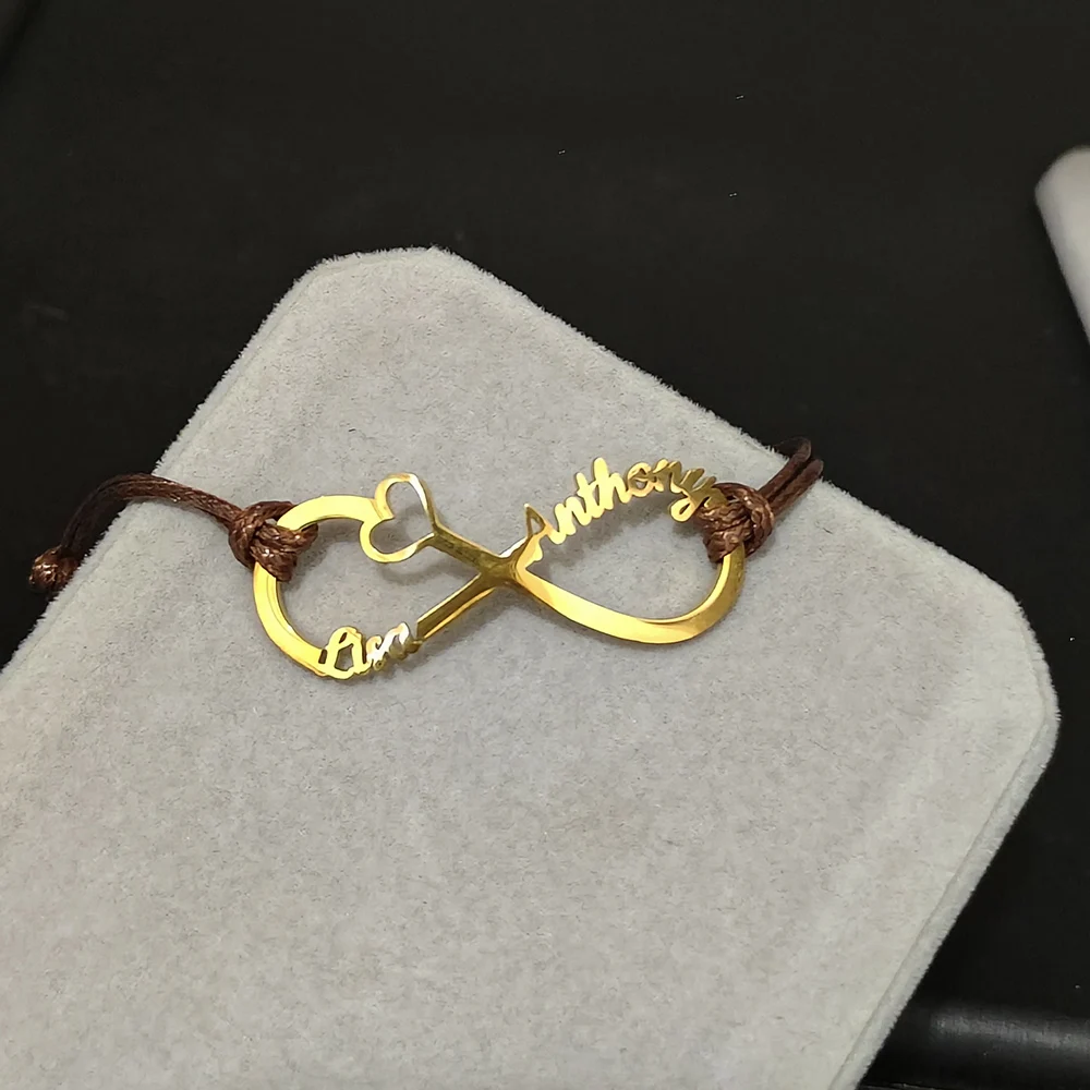 

Customized Infinity Symbol Name Letter Engraved Adjustable Handmade Rope Bracelets Stainless Steel Personalized Bracelet Jewelry