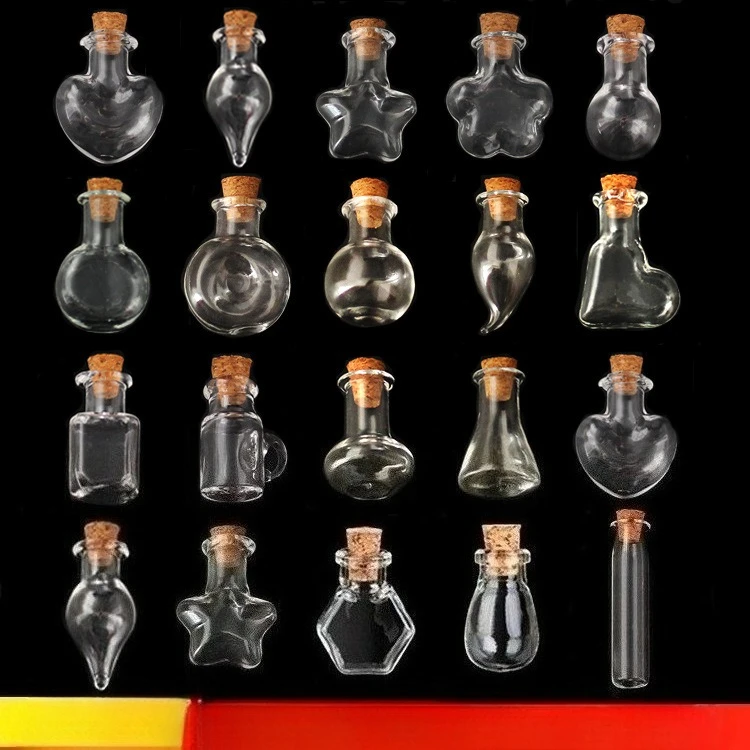 

A set of 10 small mini glass bottles in various shapes can be used for DIY pendants essential oil bottles and drift bottles