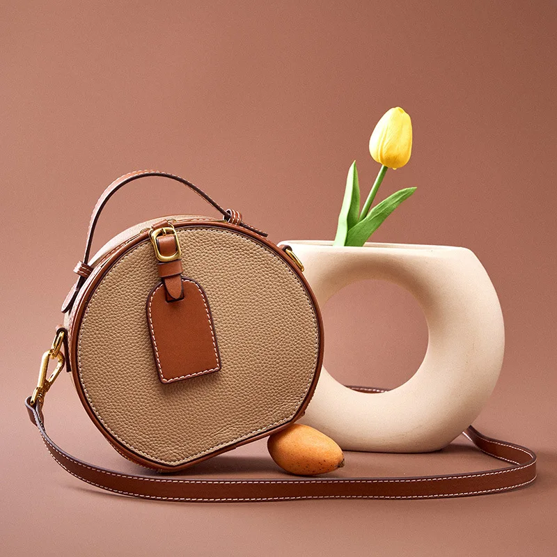 Genuine Leather 2023 Spring/Summer Versatile Top Layer Cowhide Contrast Litchi Pattern Handheld Shoulder Round Cake Women's Bag