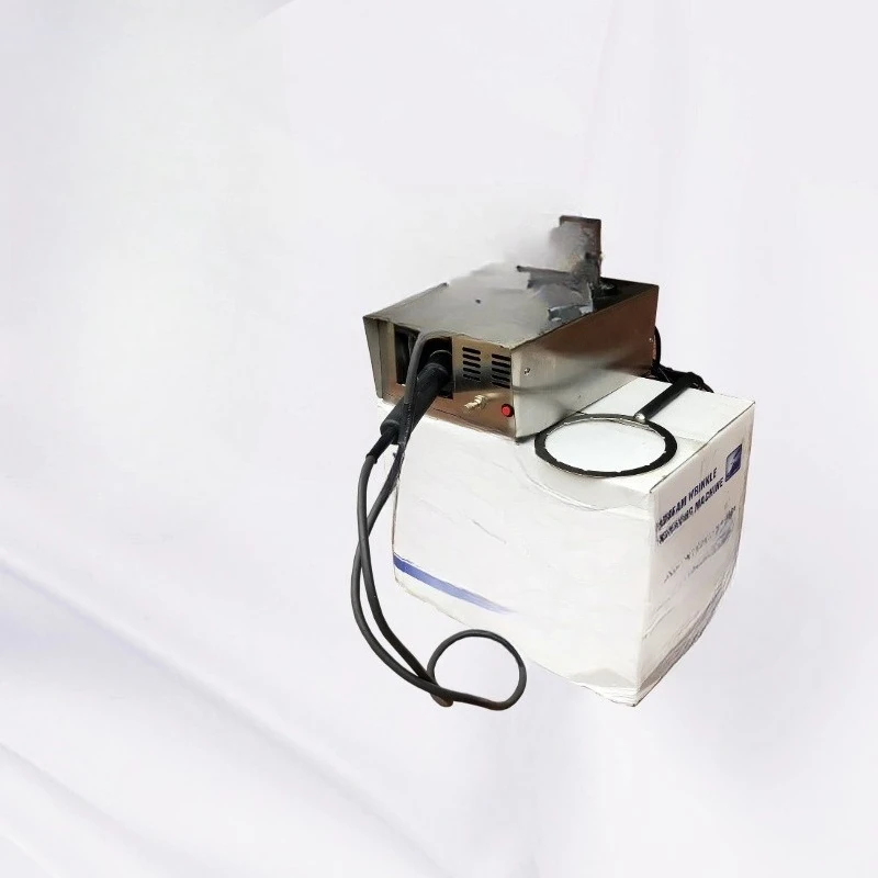 

Steam wrinkle removal and ironing machine