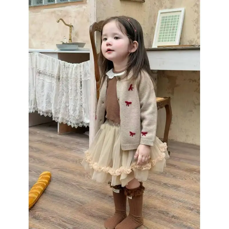 

Вязаный кардиган-свитер для девочек в японском ретро-стиле с бантом, декорированный в стиле Майярд, весенняя мода 2026 года, новая модель, верхняя одежда для малышек