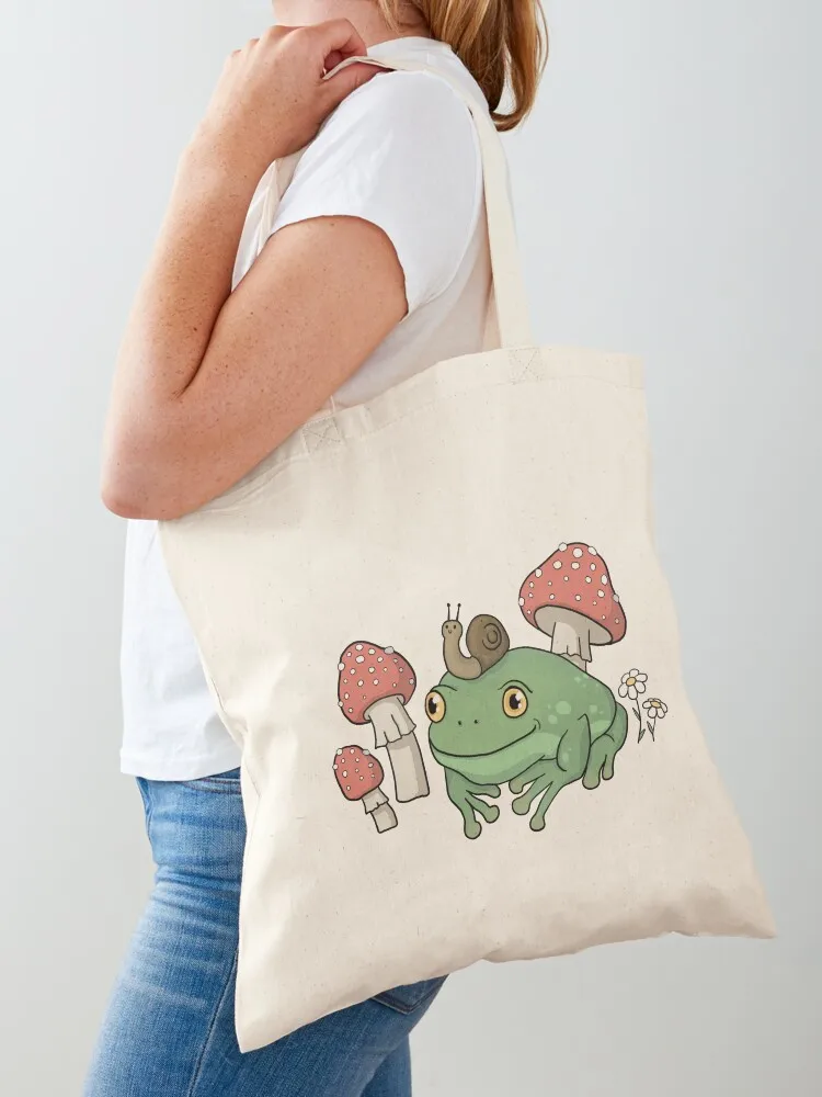 Frog with Snail Hat in Mushroom Forest: Cottagecore Aesthetic Toad, Goblincore Fairy Grunge, Toadstool Fungi Theme, Tri Tote Bag