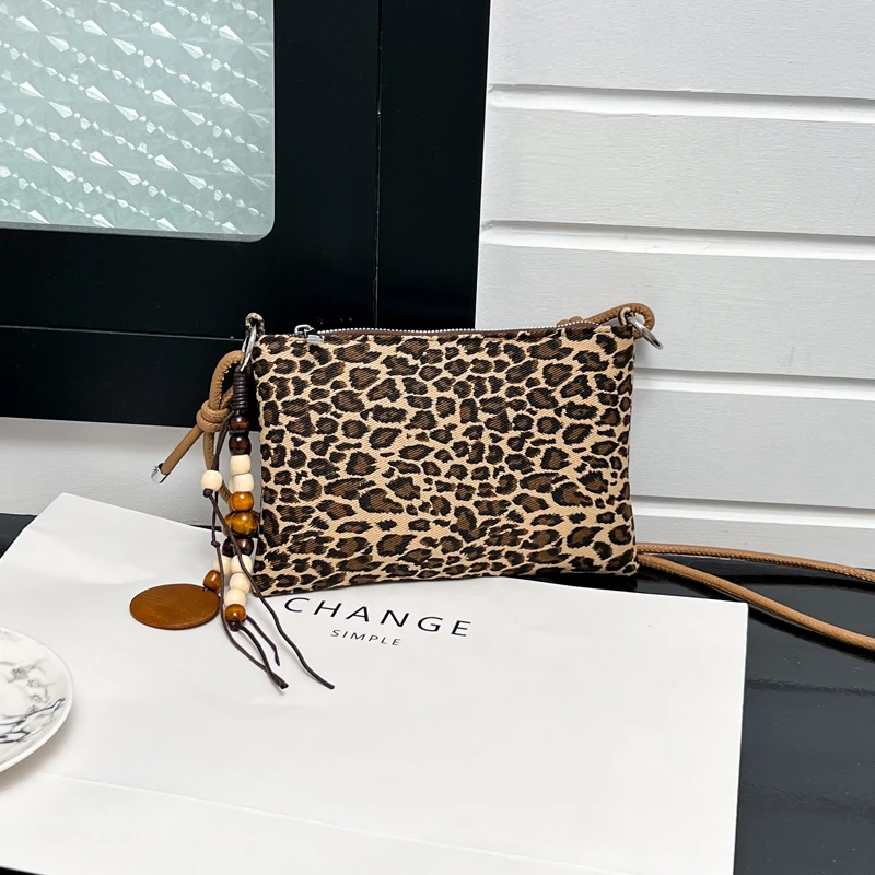 Leopard Print Crossbody Bag for Women Vintage Suede Small Shoulder Bag with Bead Pendant Casual Daily Mini Phone Purse