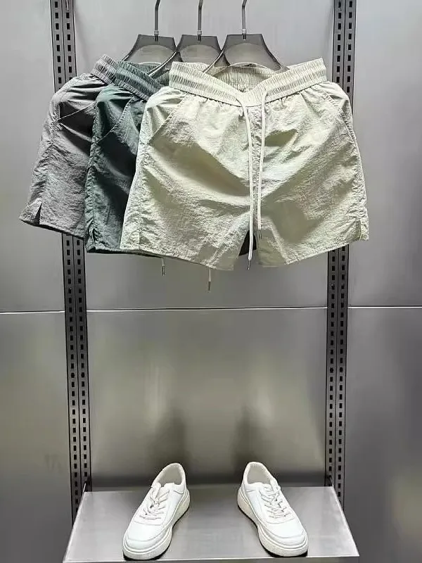 

Очень большие 300-мешочек Ice Silk Qui Dry, повседневные мужские летние тонкие свободные спортивные брюки Fourths