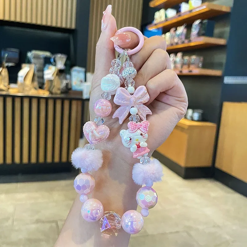 

Cute Bowknot Hairball Phone Chain Sanrio Hello Kitty Melody Cinnamoroll Kuromi Keychain Bag Pendant Kawaii Hand Drawn Bead Gift