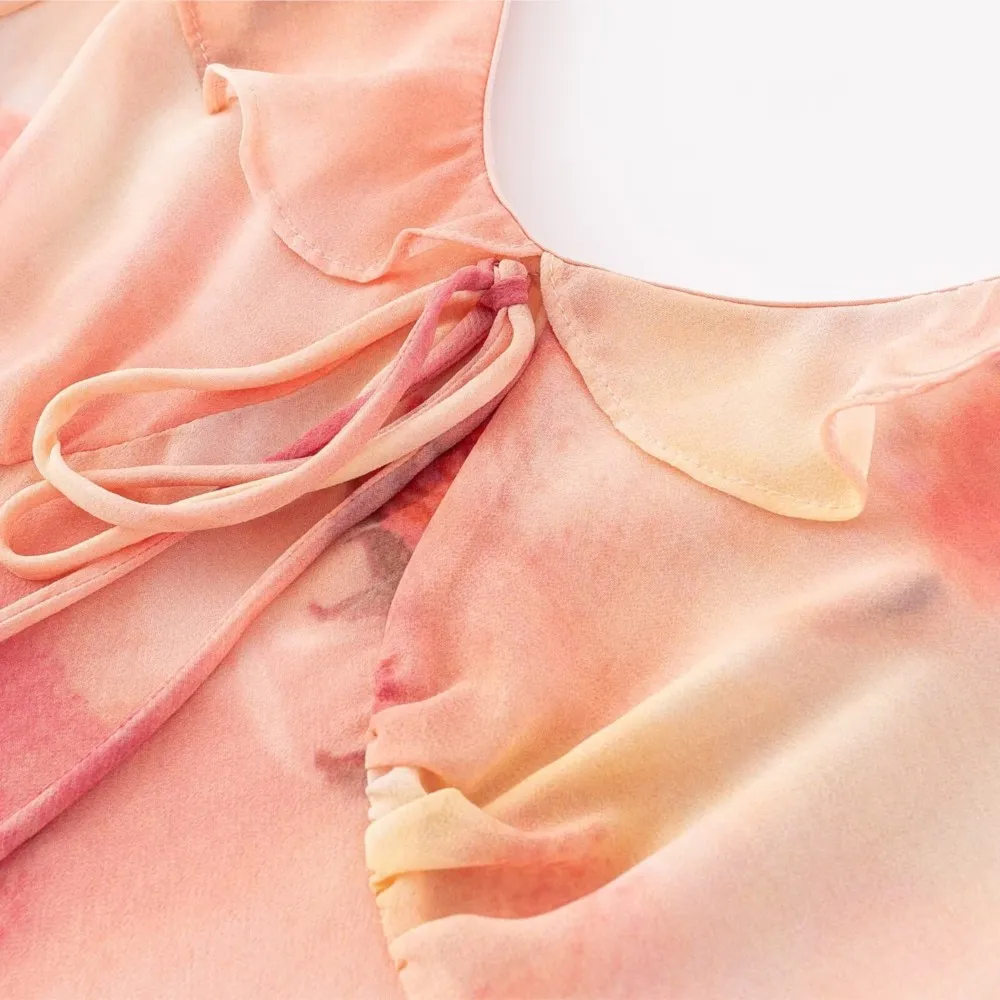 2025 Romantico arancione sfumato stampa floreale volant colletto a V manica a sbuffo abito longuette donna cravatta fiocco telai una linea abiti lunghi veste