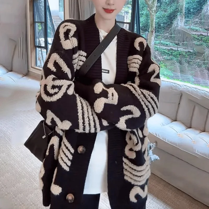 Guangzhou Tredicesimo volto Maglione lavorato a maglia da donna ular di quest'anno Grande Lang No Pilling Maglione cardigan aperto Olio sud