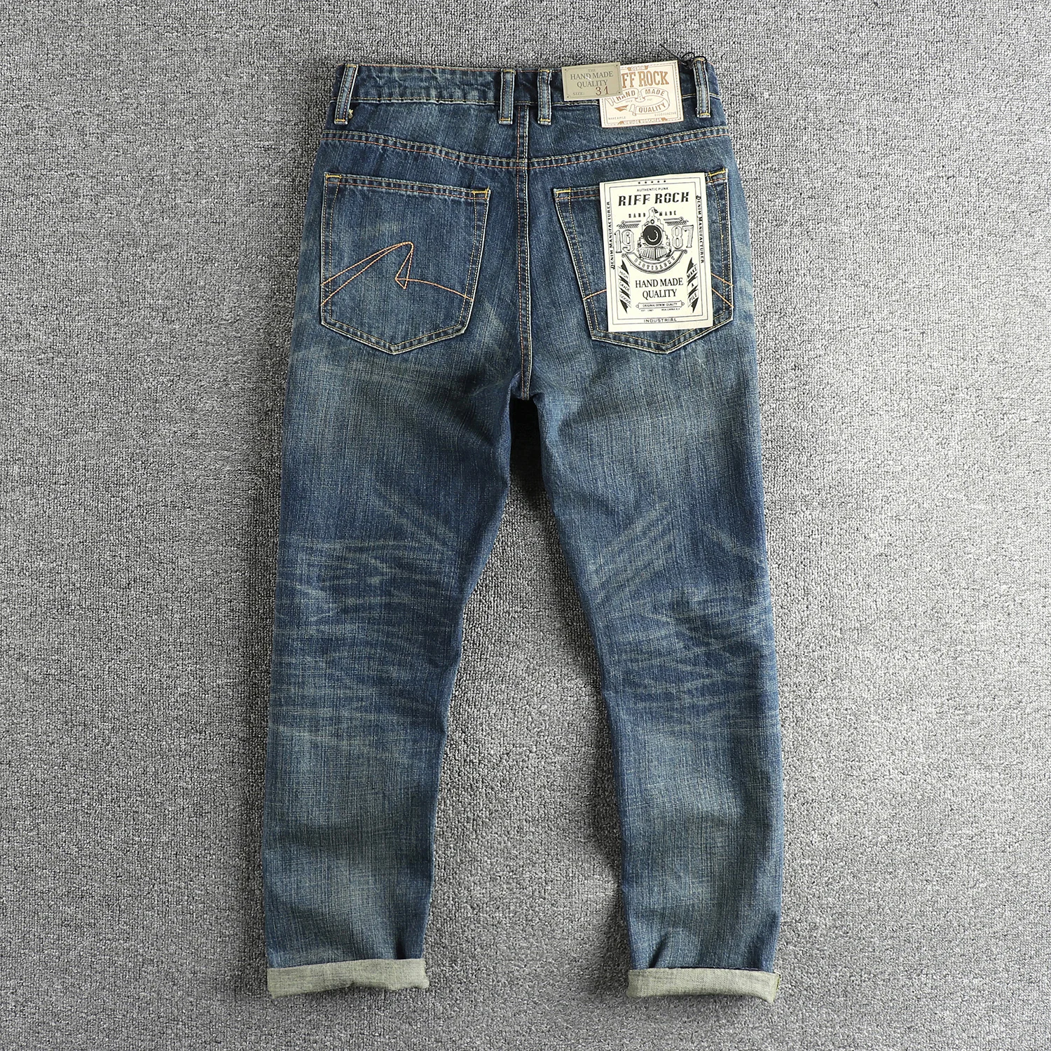 Lavaggio vintage per realizzare vecchi jeans da uomo con tasca senso del design, pantaloni casual a gamba dritta di tendenza americana