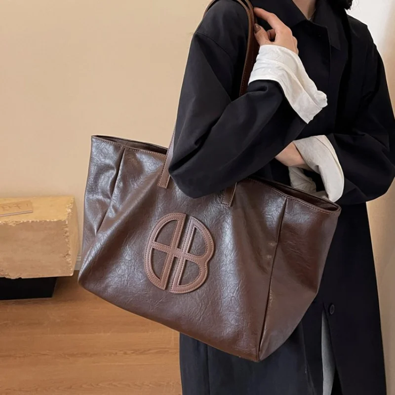 

Женская большая сумка из тонкой кожи с модным повседневным парижским повседневным образцом ​