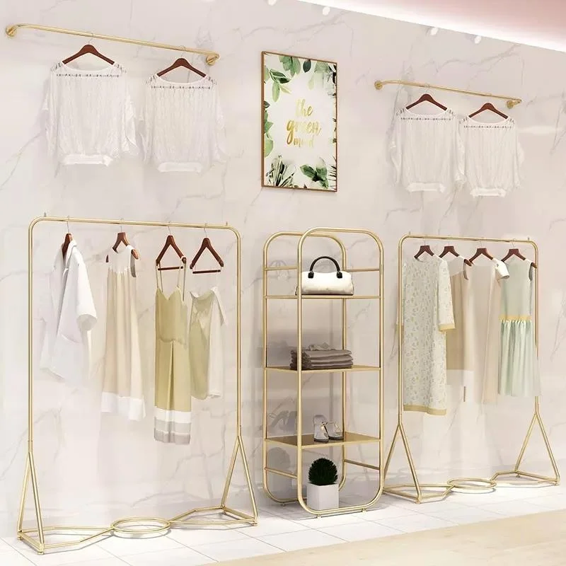 2025customized.Luxury High End Retail Store Fixture Hanging Clothing Store Custom Shop Design Metal Clothing Dress Display