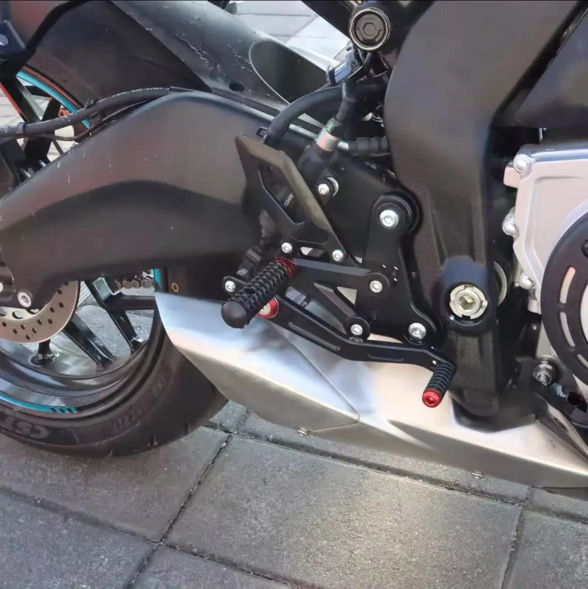 Suitable for CFMOTO 675SR-R 675NK 675SR motorcycle racing raised pedal pedal rear brake configuration