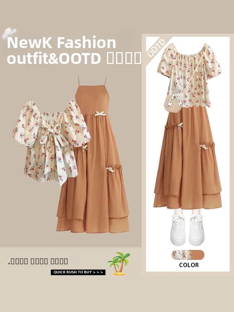 

Стильный комплект из двух предметов: блузка с пышными рукавами, бантом и завязками, а также топ с круглым вырезом и короткими рукавами из полиэстера.