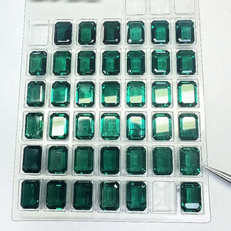 

Lab Grown Zambian Emeralds Emerald Cut Hydrothermal Hand Cutting with Cracks Inclusions Inside Selectable AGL Certificate