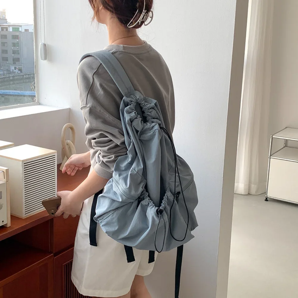 

2024 Casual Simple Drawsting Light Weight SchoolBag Korean High Capacity Travel Backpack Women Fashion Nylon Mochilas Para Mujer