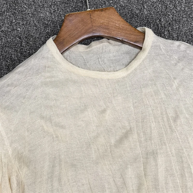 Immagine 4: Abiti casual da donna: Nuovo vestito lungo slim fit girocollo per l'estate 2026, in maglia elasticizzata che avvolge i fianchi, perfetto per le vacanze.