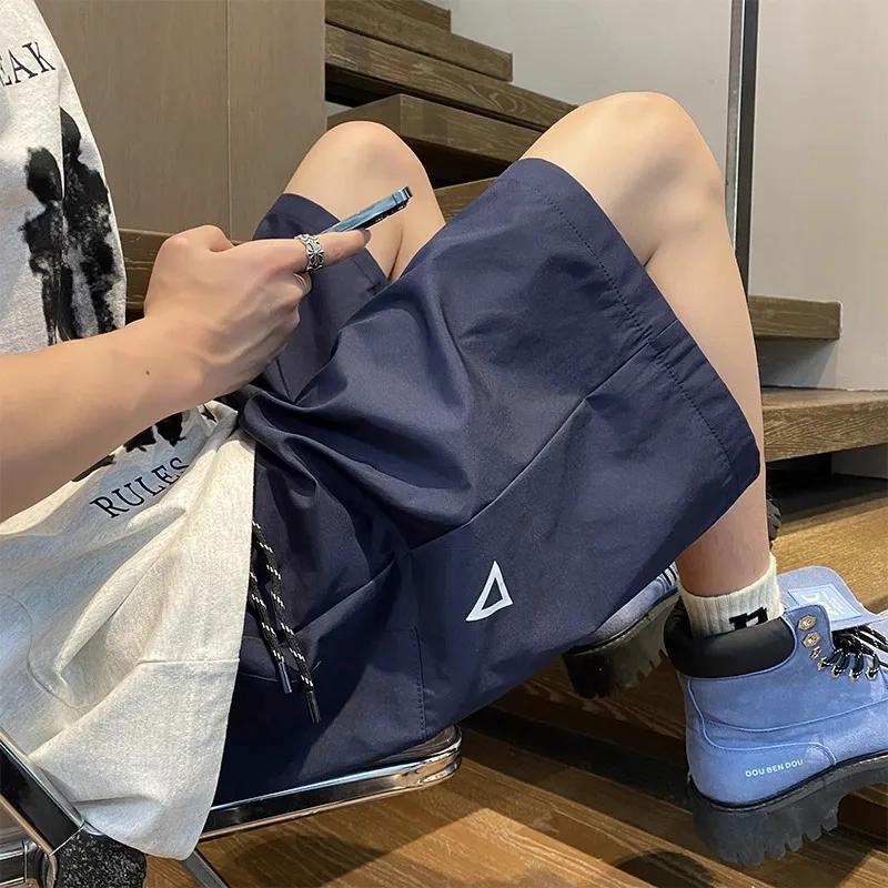 

Qui Dry Outdoor Sports orts Men's Summer New Loose Thin Running Training Casual Five-Quarter Pants Youth Beach Faion