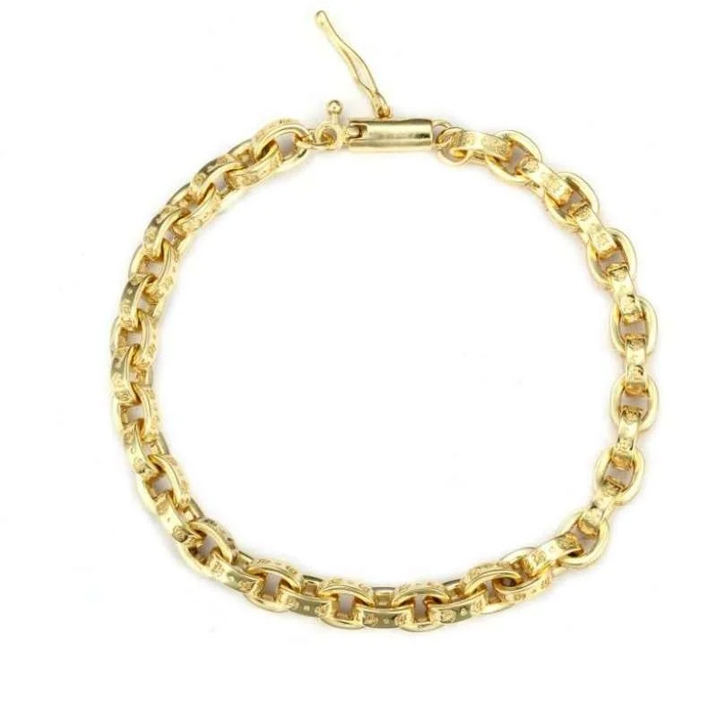 

Gold Textured Link Bracelet: Sleek Luxurious Statement Jewelry